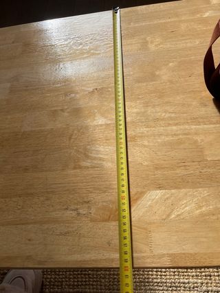 Tavolo da centro in legno con gambe in acciaio laccato nero