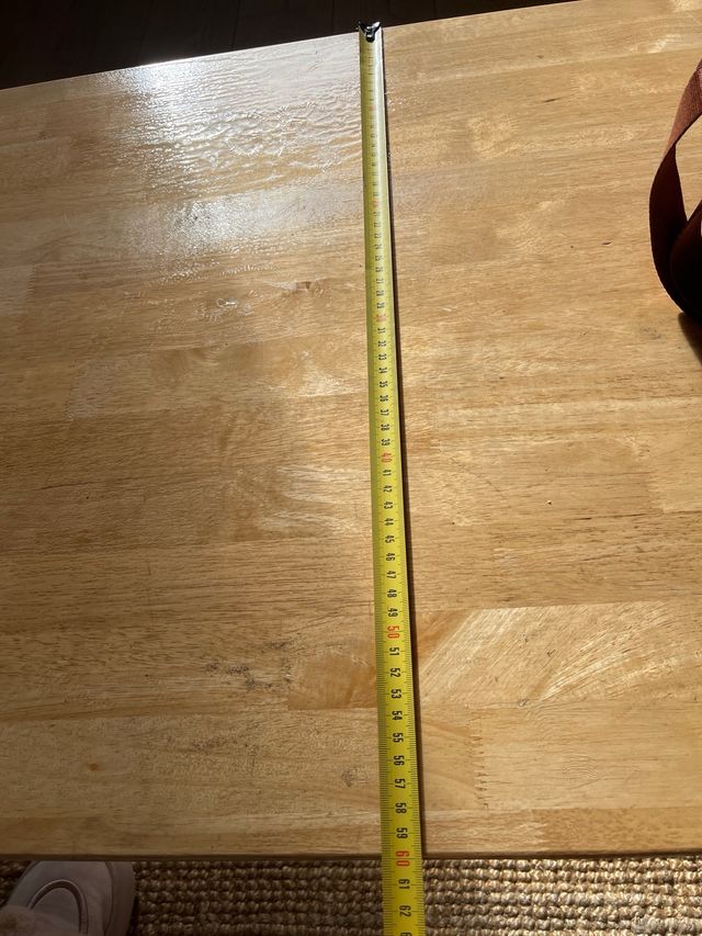 Tavolo da centro in legno con gambe in acciaio laccato nero