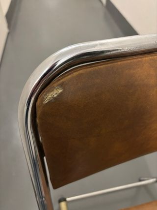 Silla plegable de cuero sintético y metal