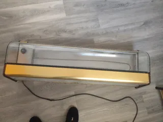 Vitrina expositora tapas dorada