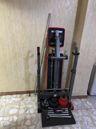 Banco de pesas con discos