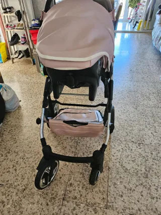 Carrito de bebé rosa junama
