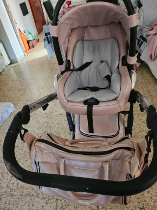Carrito de bebé rosa junama