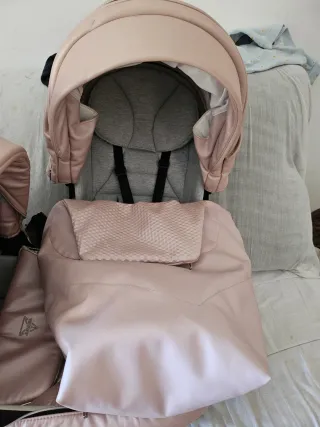 Carrito de bebé rosa junama