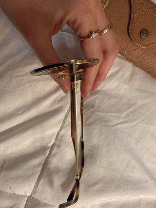 Gafas de sol Ray-Ban doradas y marrones