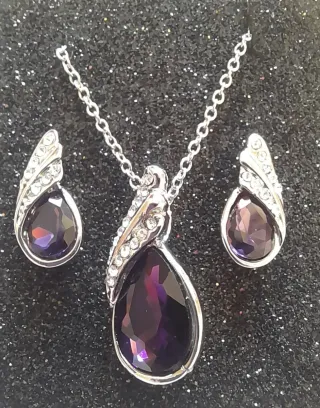 Conjunto lágrima granate y plata