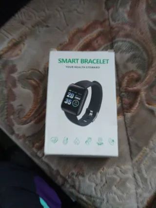 Reloj con billetera y bolígrafo