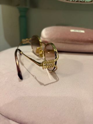 Gafas de sol Miu Miu doradas y rosas