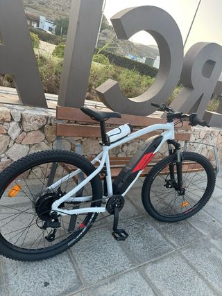 Bicicleta eléctrica como nueva con asiento de gel