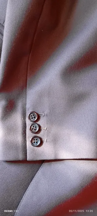 Traje de hombre hecho por sastre.