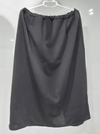 Traje precioso de falda y blusa