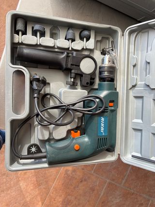 Taladro eléctrico con accesorios