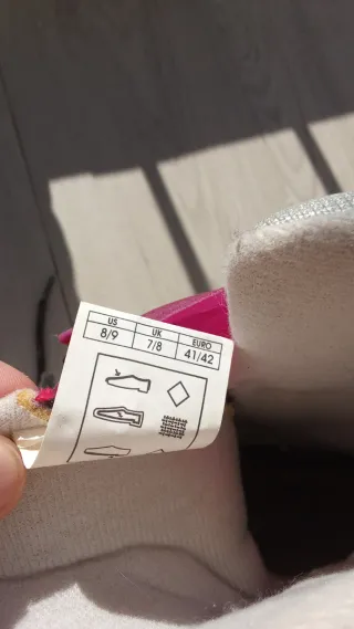 Patines en línea blancos con ruedas naranjas