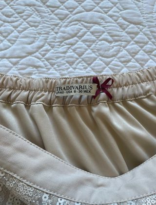 Falda mini lentejuelas beige