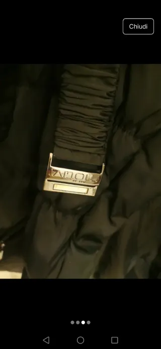 Piumino nero con pelliccia