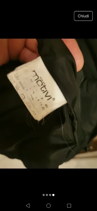 Piumino nero con pelliccia