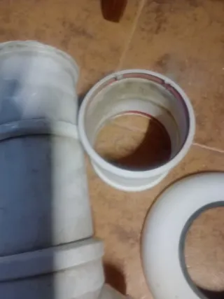 Tubos, codos, manguitos y chimenea