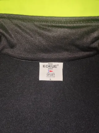 Chaqueta ciclismo gris y negra