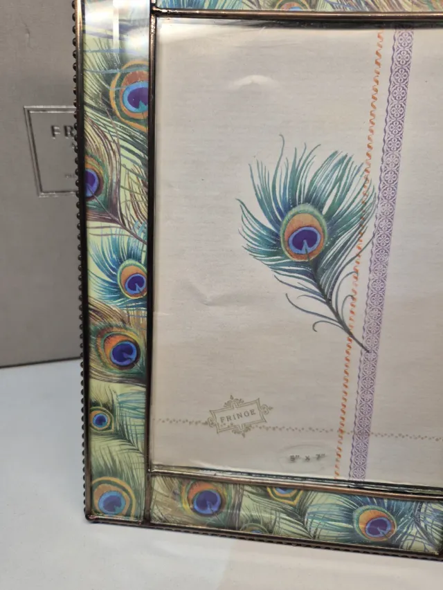 Cornice portafoto piume di pavone