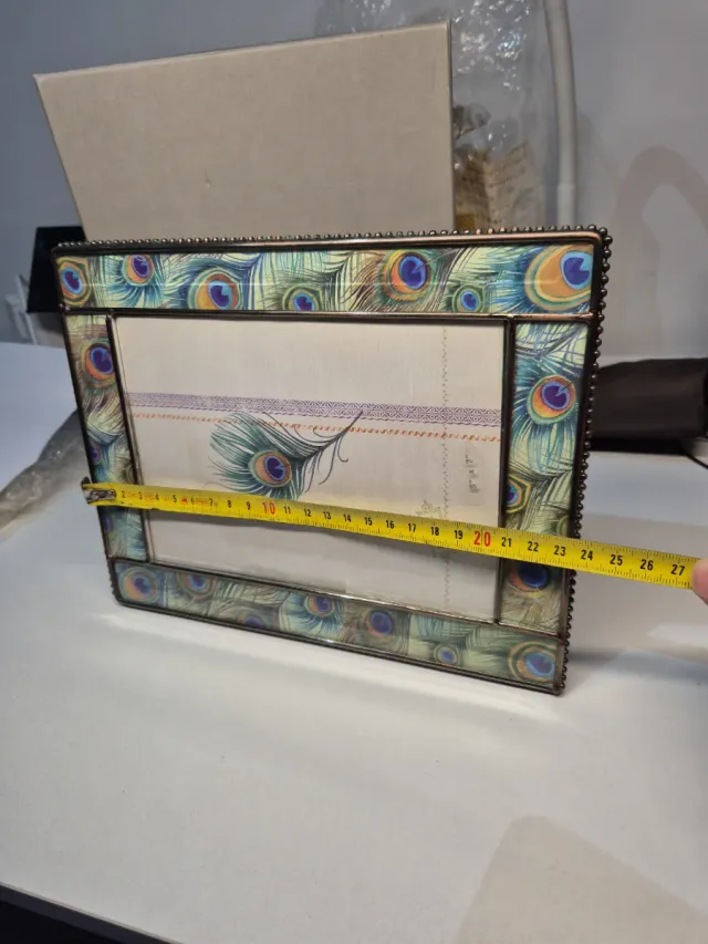 Cornice portafoto piume di pavone