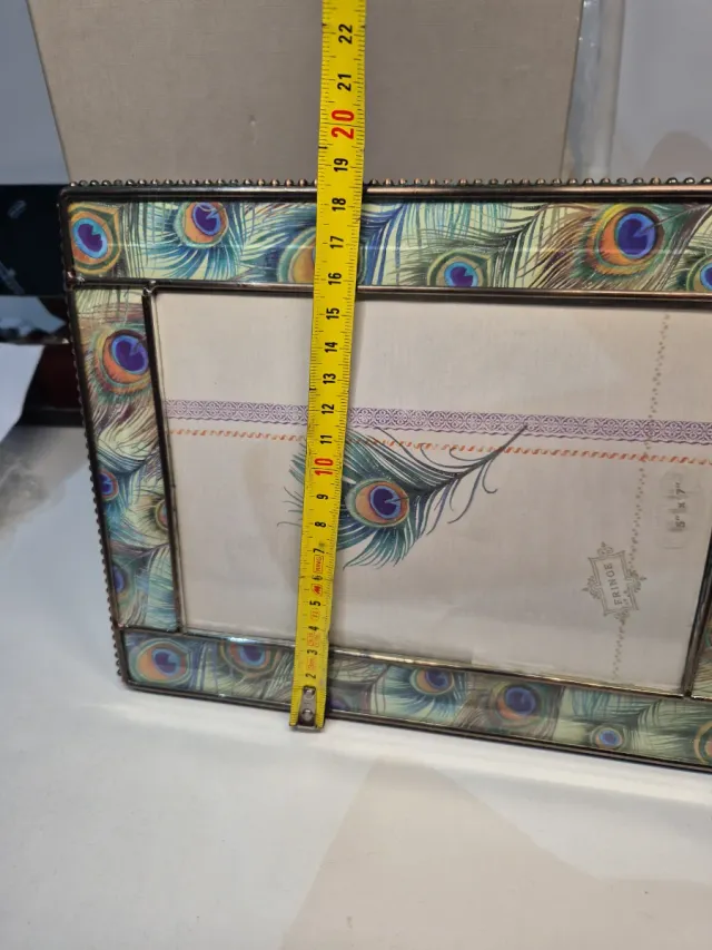 Cornice portafoto piume di pavone