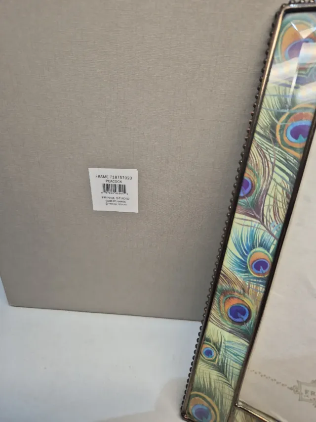 Cornice portafoto piume di pavone