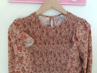 Blusa de flores beige y roja talla S