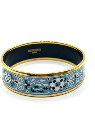 Pulsera Hermès esmaltada azul y dorada