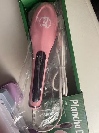 Plancha de pelo peine rosa