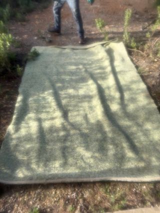 Alfombra de cotone blanco y negro reversible