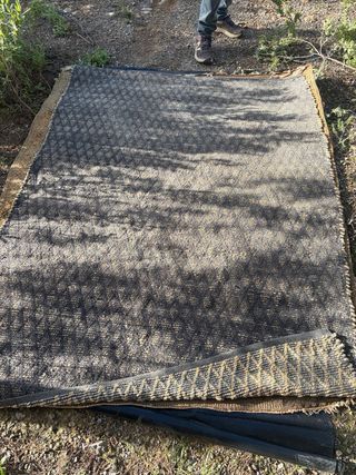 Alfombra de cotone blanco y negro reversible