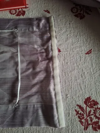 Tende a pacchetto viola e argentate