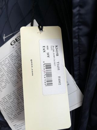 Chaqueta acolchada azul con capucha