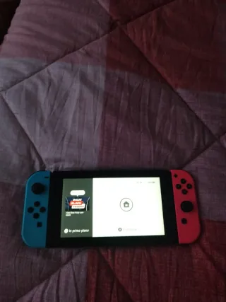 Nintendo Switch Blu/Rosa -graffio sul joycon blu