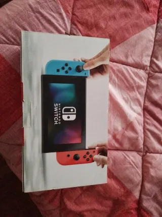 Nintendo Switch Blu/Rosa -graffio sul joycon blu