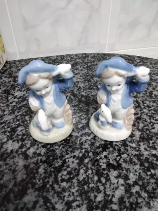 Figuras de porcelana niño y conejo