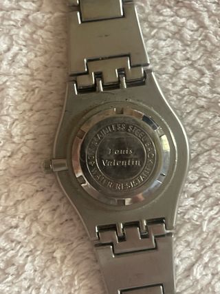 Reloj Swatch Plata y Blanco