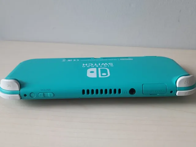 Switch lite magica + 256 gb y juegos