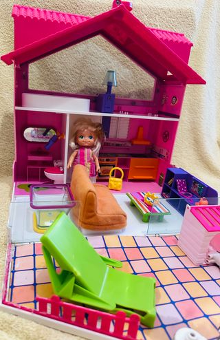 Casa maletín para muñecas