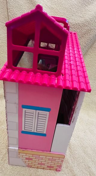 Casa maletín para muñecas