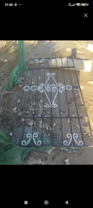 Puerta de hierro forjado