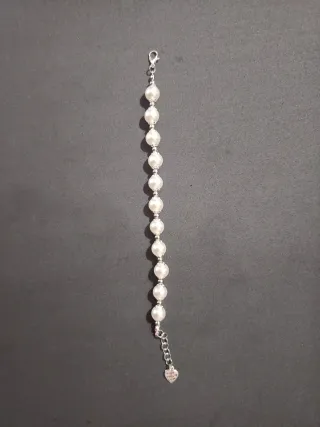 Braccialetto perle bianche e argento