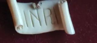 Cristo tallado en marco plata