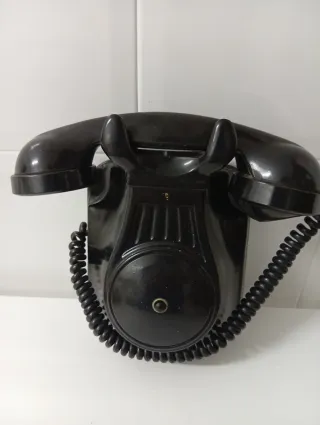 Teléfono antiguo de pared años 50