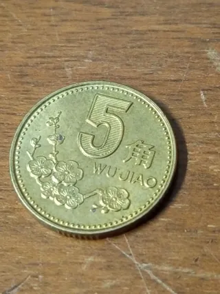 Monedas Chinas y Mejicanas.