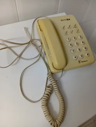 Teléfono fijo antiguo Forma Telefónica