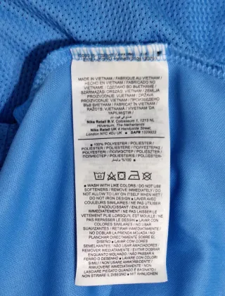 Camiseta Nike Dri-Fit Mujer celeste