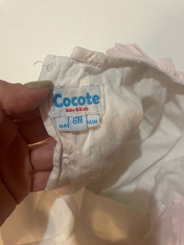 Vestido de bebé blanco y rosa