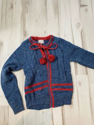 Chaqueta de punto con ochos y pompones