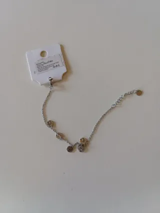 Bracciale donna acciaio con ciondoli